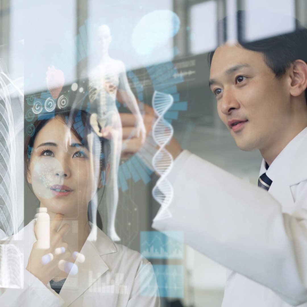Medical occupations looking at glass screen. Medical technology. Biotechnology. Medtech.